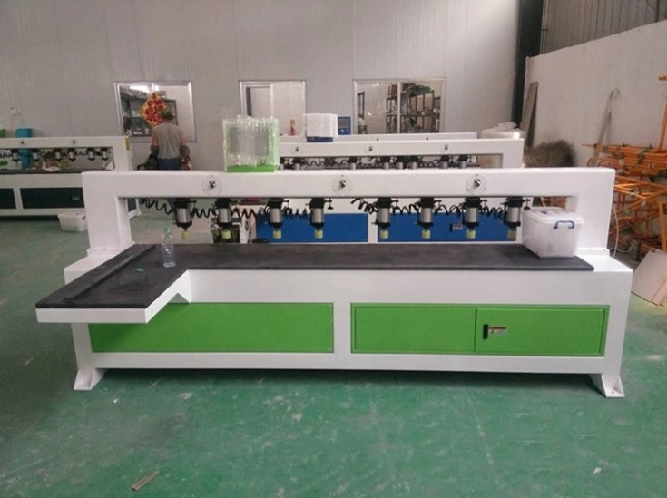 Fully Automatic CNC Infrared Laser Side Hole Drilling Machine for Panel Furniture (5) Fully Automatic CNC Infrared Laser Side Hole Drilling Machine for Panel Furniture (5)